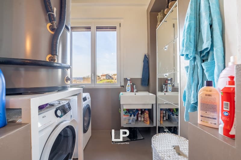Laundry room with a washing machine and a dryer