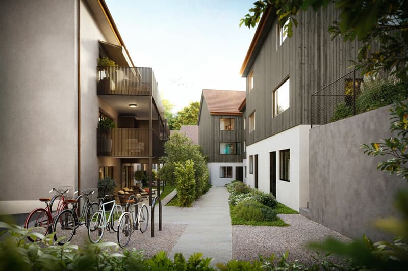 Zugang zum Townhouse via Predigerweg. Fahrradabstellplätze plus Lift zur Tiefgarage.