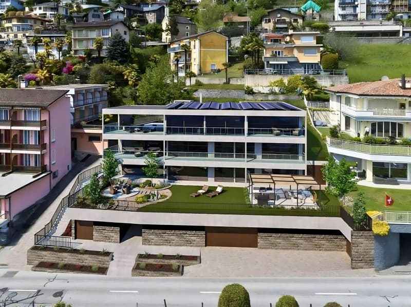 Moderno e prestigioso appartamento di 4.5 locali con terrazza, giardino privato attrezzato e spettacolare vista lago (8)