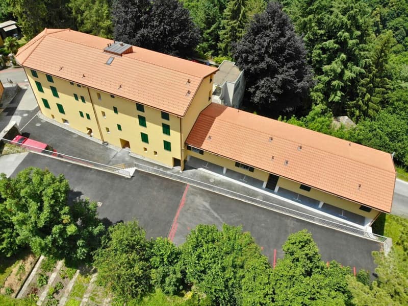 Attico moderno di 3.5 locali con balcone, vista e due posti auto (15)