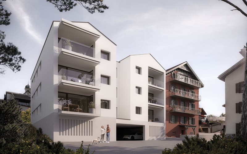 Multi-storey residential building with glass balconies, underground garage, two people and a dog standing in front of the entrance, other buildings behind