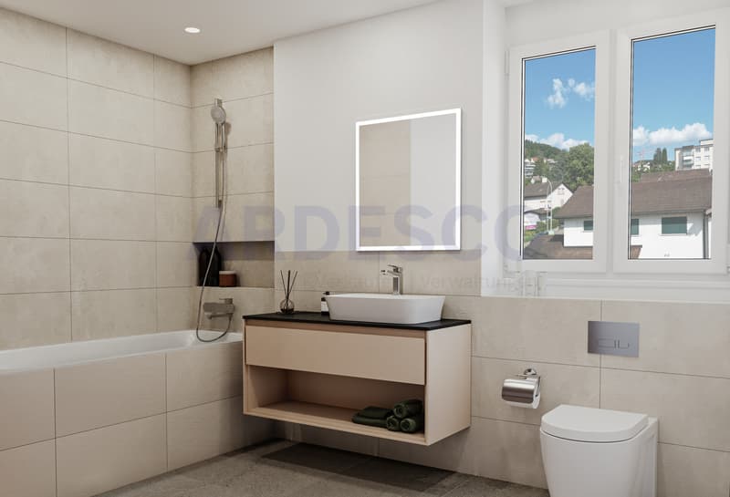Badezimmer mit Badewanne, WC und Lavabo