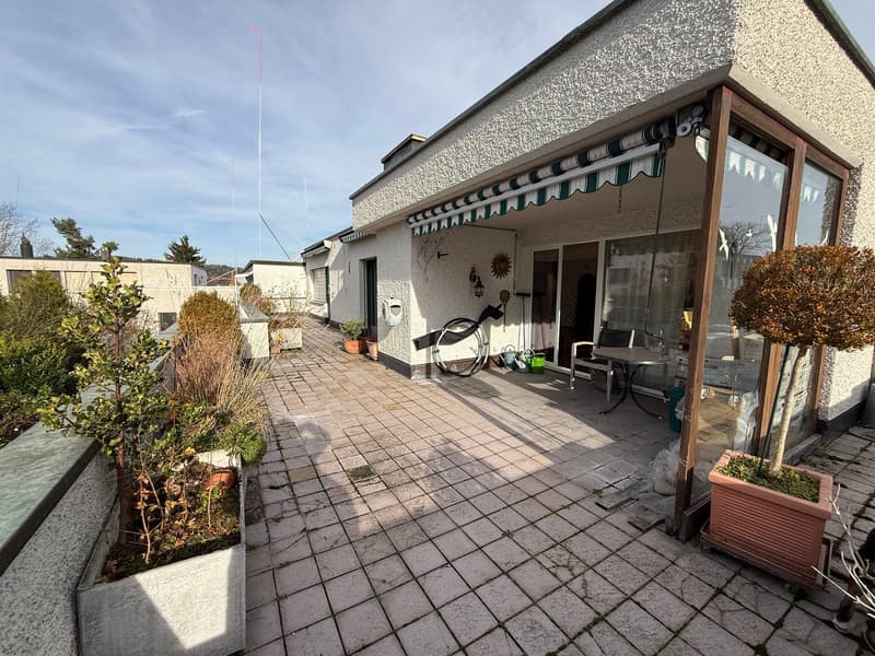 terraced house, balcony, tiled floor, plants, open glass door