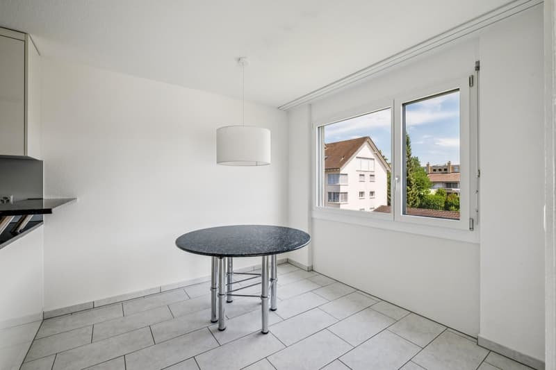 Dank des offenen Essbereichs bleiben Sie auch beim Kochen mitten im Familien geschehen
