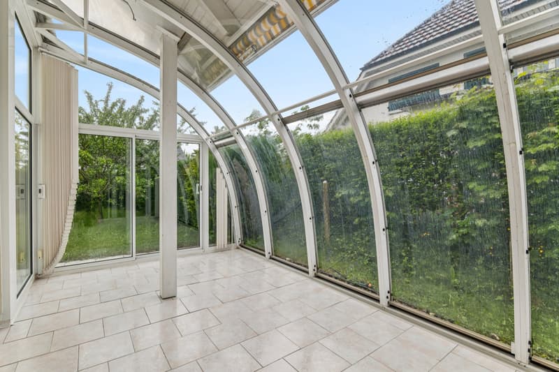 Ganzjährig nutzbarer Wintergarten mit Gartenanschluss