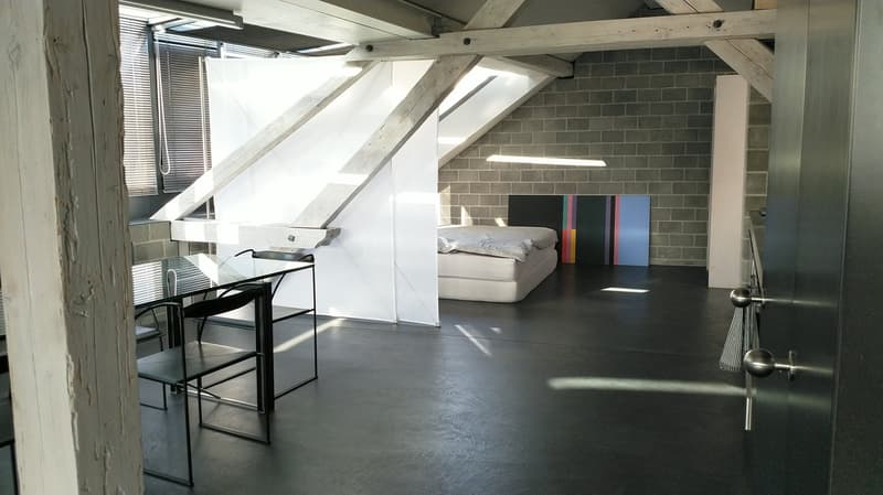 glass table, chairs, bed, open window, brick walls, wooden beams, open door