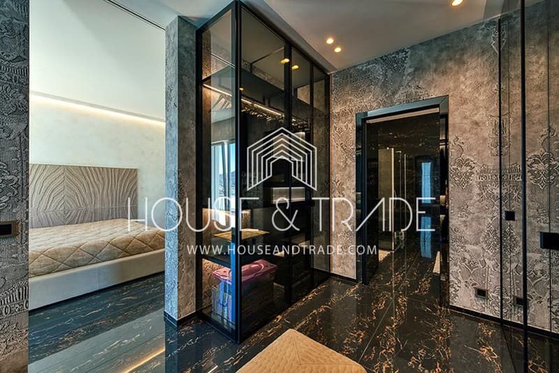 bedroom with bed, window, marble flooring, wardrobe