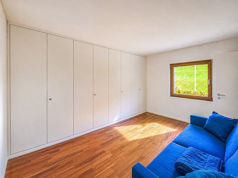 Casa contigua con giardino a Villa Luganese (6)