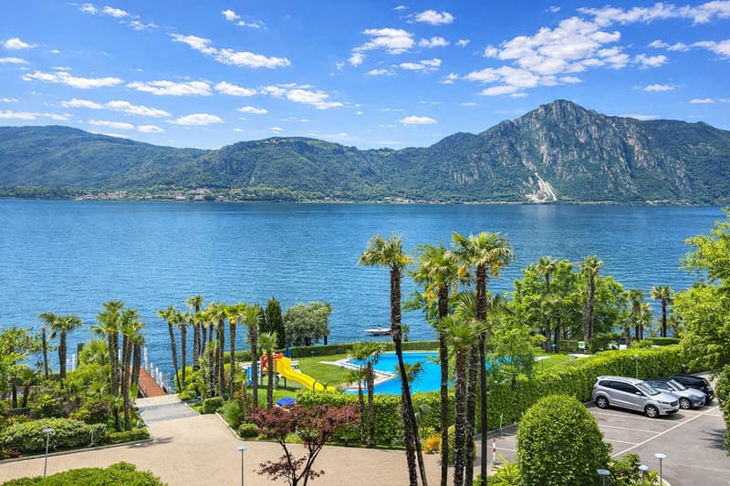 2.5 locali vista lago in residenza con piscina e darsena a Bissone (1)