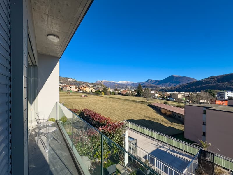 Moderna casa contigua con giardino ad Agno (8)