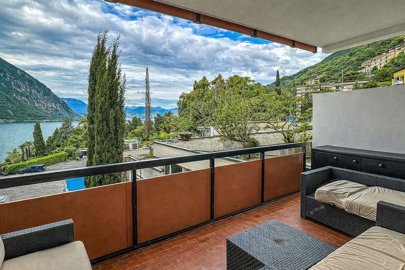 3 locali vista lago in residenza con piscina e darsena a Bissone (5)
