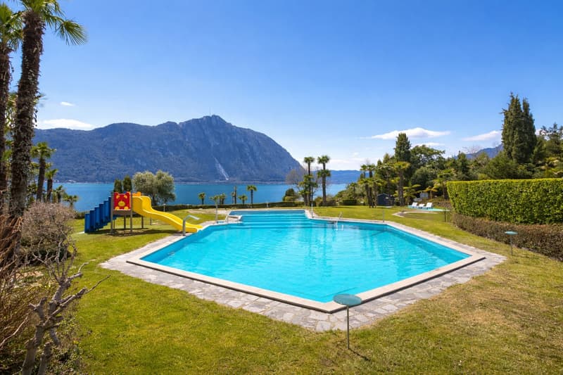 3 locali vista lago in residenza con piscina e darsena a Bissone (6)