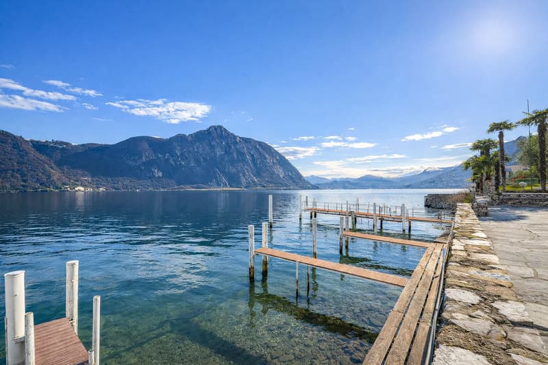 3 locali vista lago in residenza con piscina e darsena a Bissone (7)