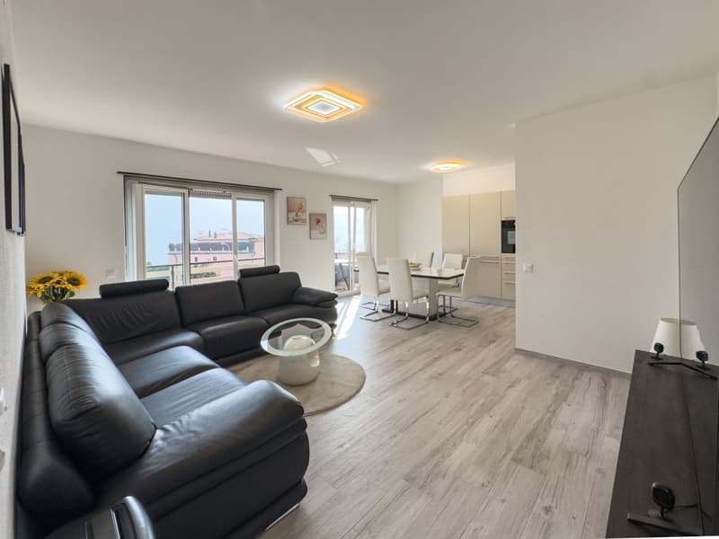 Appartamento 3.5 locali con parziale vista lago a Melide (1)