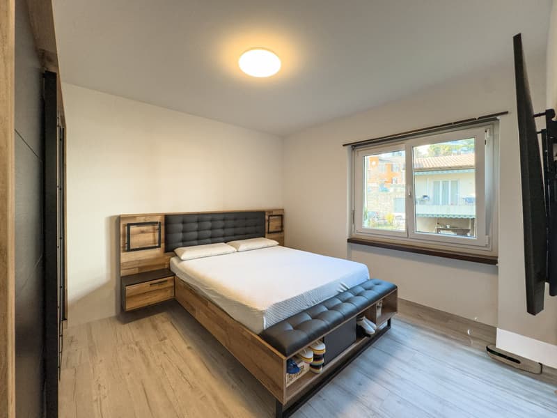 Appartamento 3.5 locali con parziale vista lago a Melide (3)