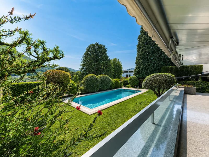Villa con giardino e piscina a Collina d’Oro (13)