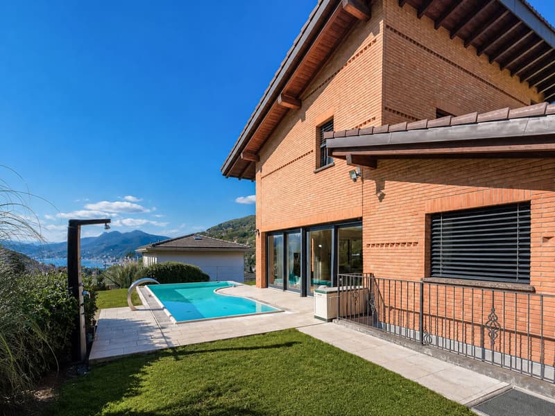 Casa unifamiliare con giardino e piscina a Bioggio (8)