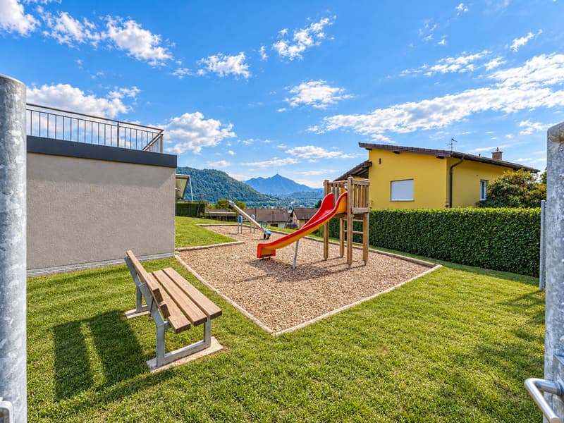 Casa a schiera con giardino ad Agno (12)