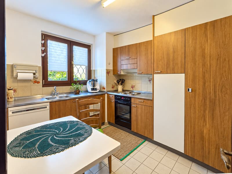 Casa contigua con terrazza e giardino a Gravesano (4)