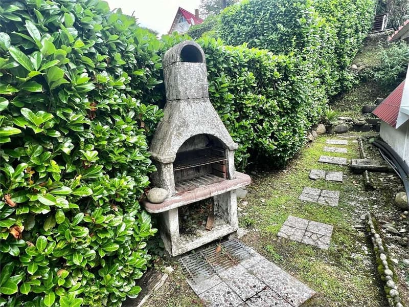 Curata casa vacanze con ampia terrazza, giardino e vista lago (11)