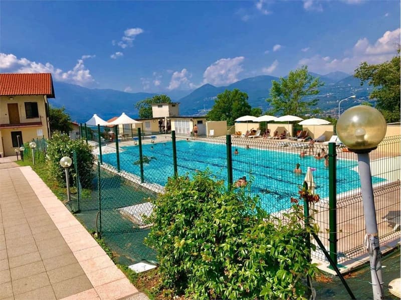 Curata casa vacanze con ampia terrazza, giardino e vista lago (13)