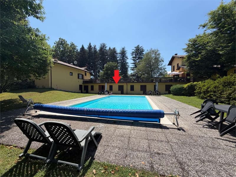 Grazioso bilocale con terrazza, piscina e garage (9)