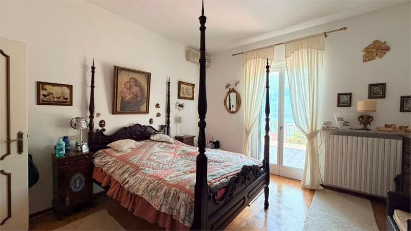 Esclusiva villa con splendida vista lago, piscina e assoluta privacy a (8)