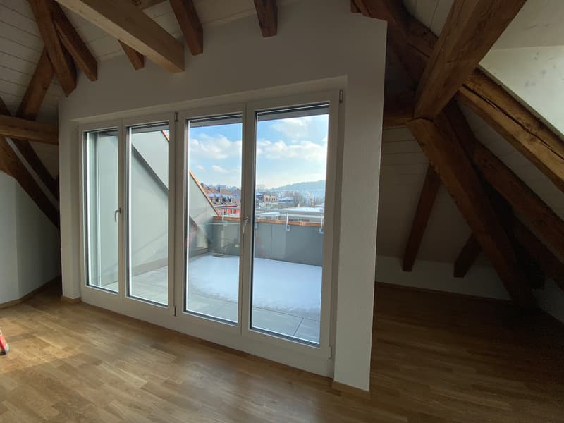 Wohnzimmer mit Balkon
