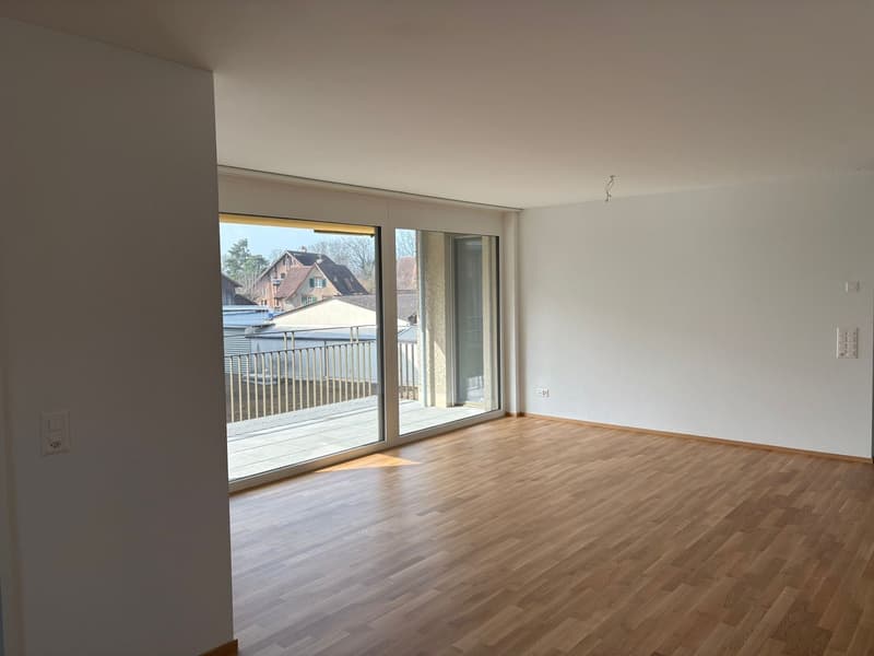 Wohnzimmer mit Balkon