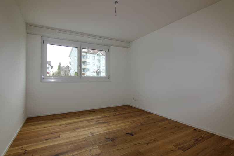 Schlafzimmer mit Parkettboden