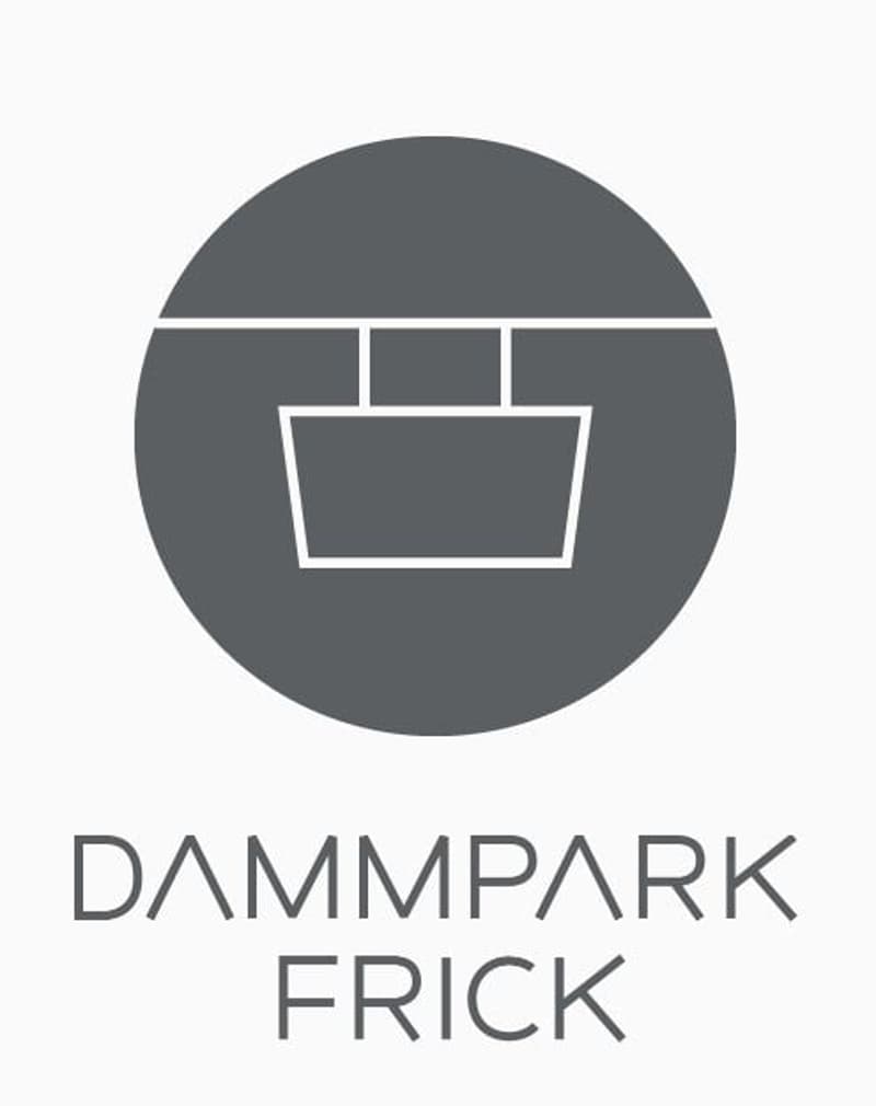 The image shows a simple floor plan or layout diagram, consisting of a circular shape with a rectangular shape inside it. The text below the diagram reads 'DAMMPARK FRICK'.