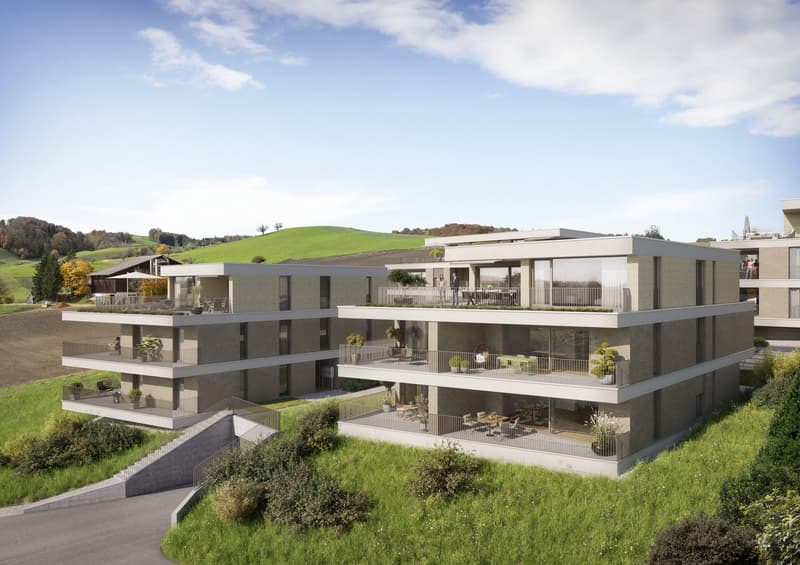 2-storey building, multiple balconies, large windows, green surroundings