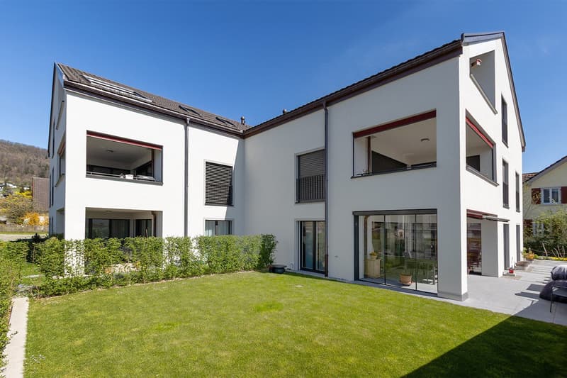 modern white house, 3 floors, multiple balconies, large windows, glass doors, garden, lawn