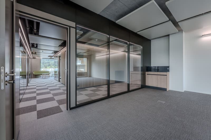 modern office room, glass walls, checkered floor, open door, cabinets, sink