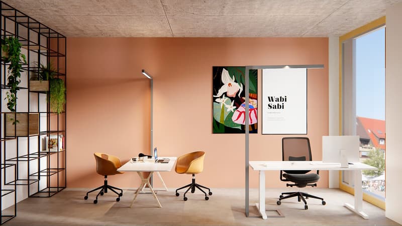 modern office room with two desks, two chairs, a shelf with plants, a painting, and a large window