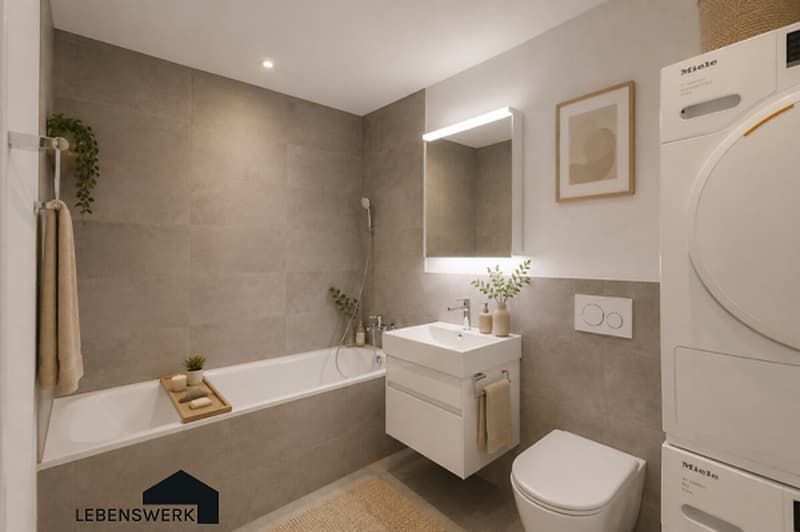 Modernes Badezimmer mit Badewanne und praktischer Waschturm-Lösung  komfortabel und funktional gestaltet.