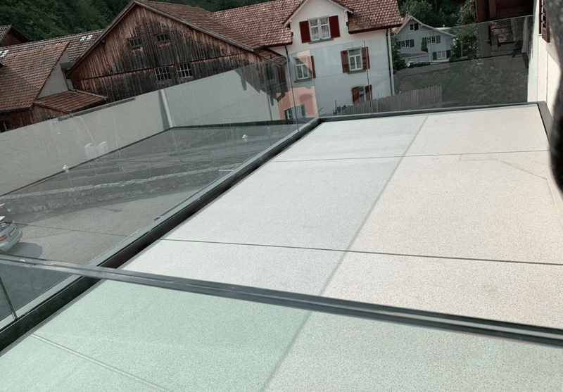 Floor to ceiling glass windows, glass roof, view