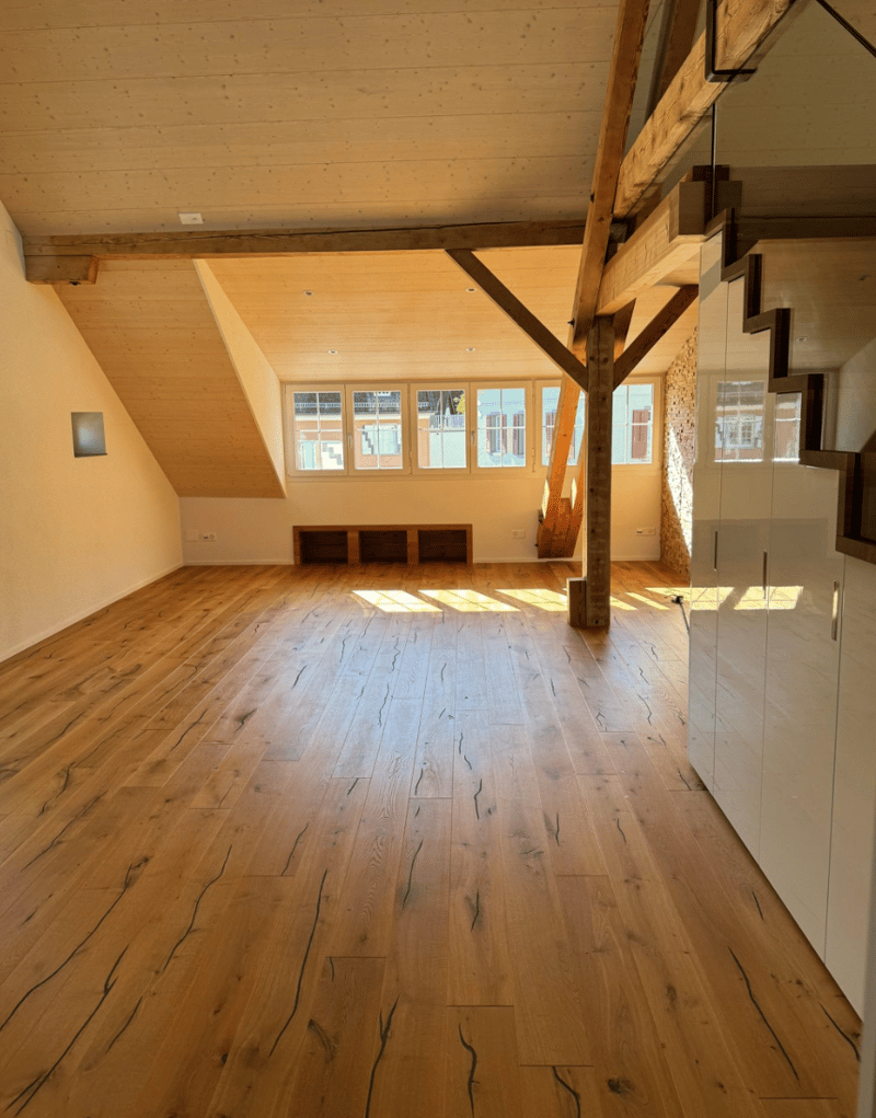 wooden floor, wooden beams ceiling, stairs, windows, no furniture