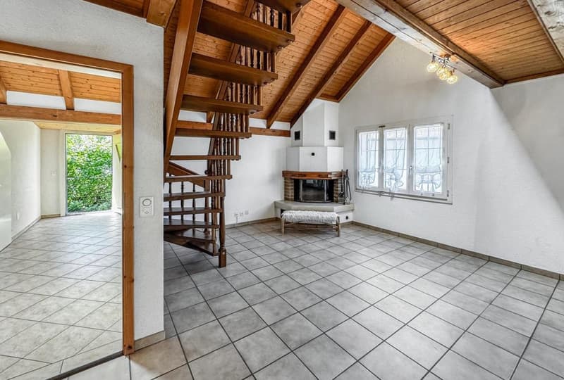 Open living room, spiral staircase, fireplace, wooden ceiling