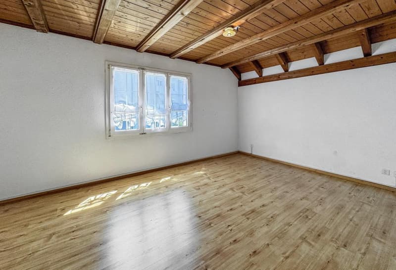 wooden floor, white wall, wooden ceiling, windows, power outlet
