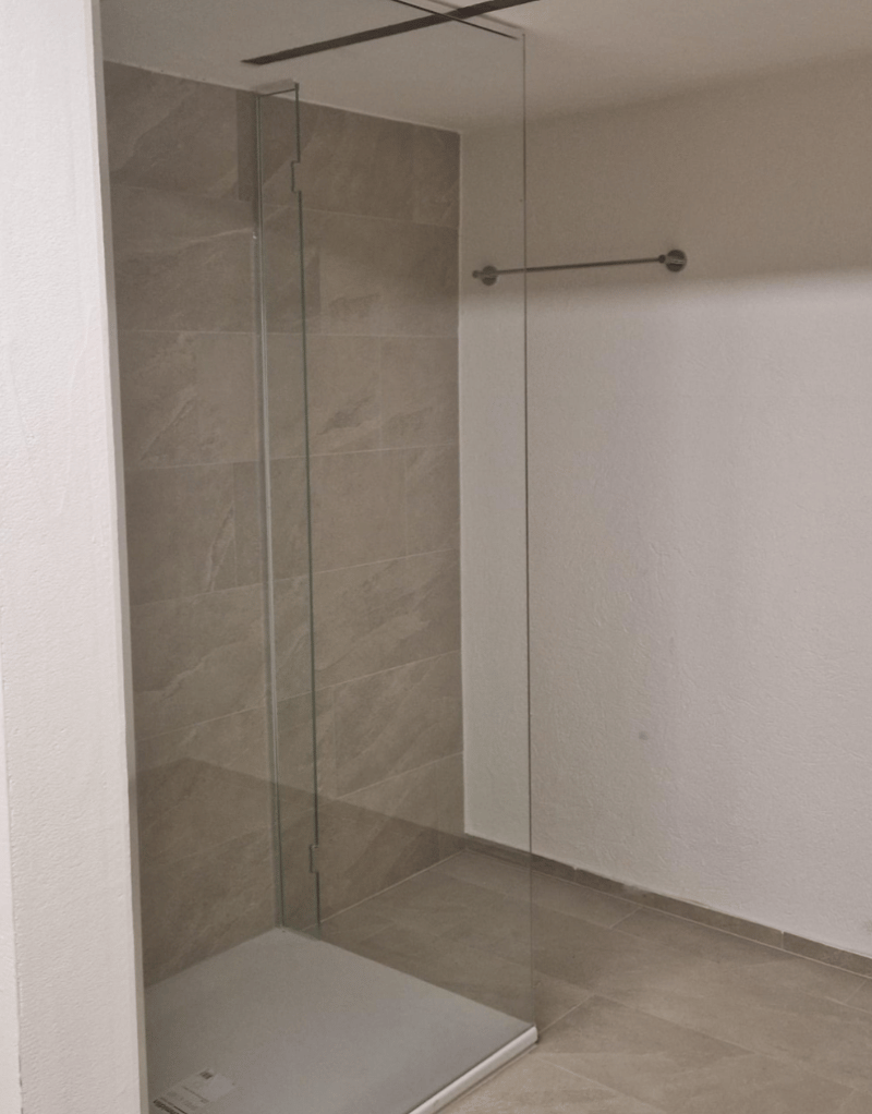 shower stall, fully tiled, glass doors, empty room
