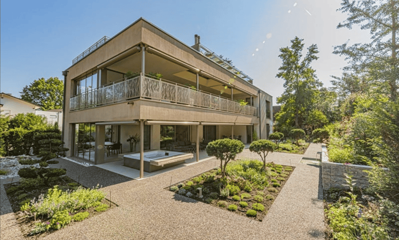 Modern house, 2 stories, large windows, balcony, outdoor jacuzzi, garden