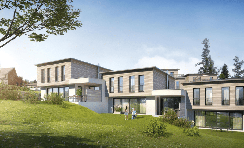 Modern architectural design with a combination of glass and wooden facades, set on a sloped terrain with lush greenery.