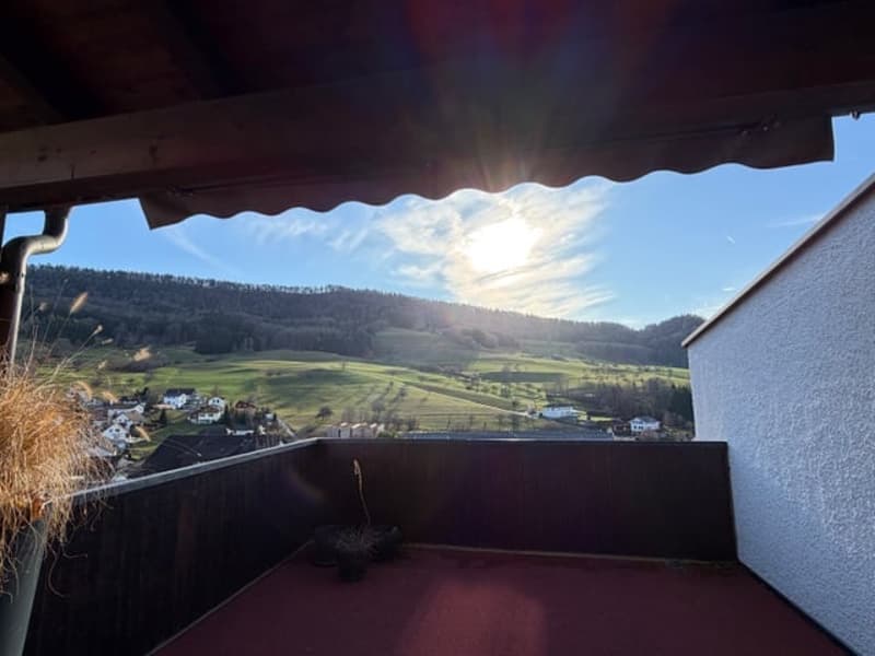 balcony with a view of the hills