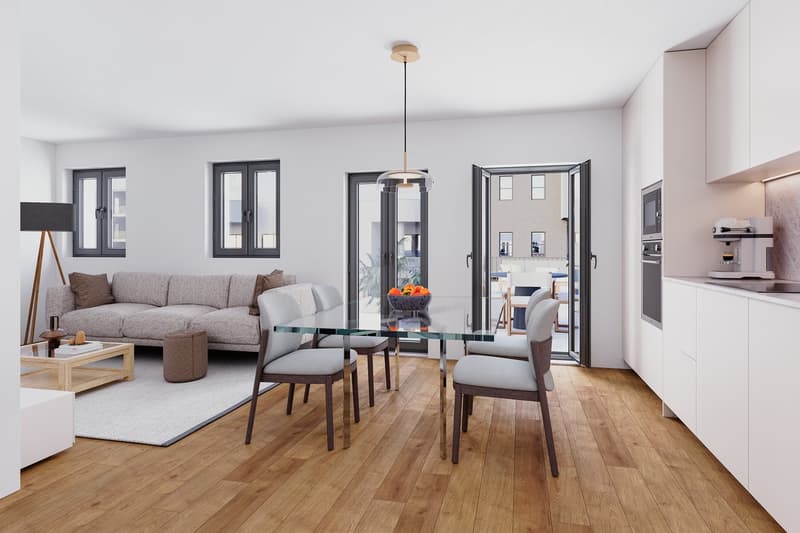 Modern dining room with glass table and chairs, glass doors leading to balcony, white walls, wooden floors, white cabinet, gray couch, and kitchen appliances.