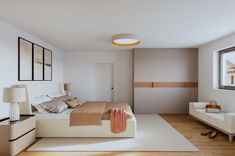 bed with pillows and blanket, bedside lamps, wardrobe with two sliding doors, couch, handbags