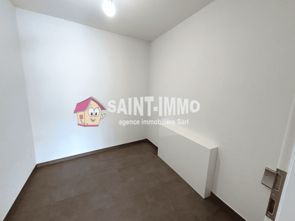 Appartement neuf de 4.5 pièces (104 m2) avec terrasse / jardin privatif et couvert pour voiture 14