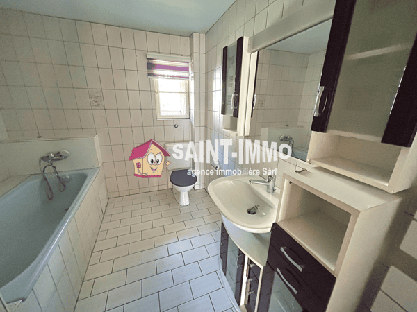 Immeuble locatif à réhabiliter de 4 appartements, un local, une parcelle constructible et un garage 11