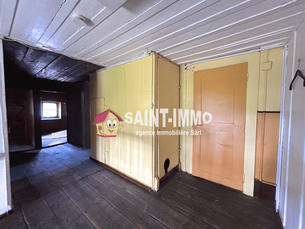 Immeuble locatif à réhabiliter de 4 appartements, un local, une parcelle constructible et un garage 15