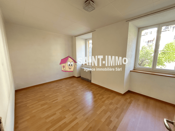 Immeuble locatif à réhabiliter de 4 appartements, un local, une parcelle constructible et un garage 8